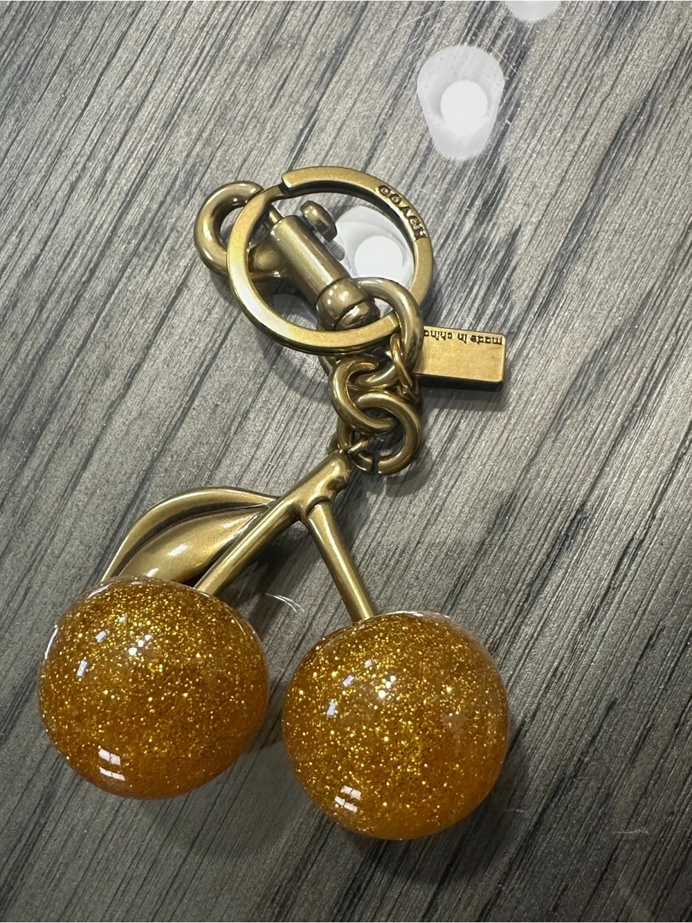Coach Gold-Tone Glitter Cherry Keychain - Picture 2 of 2